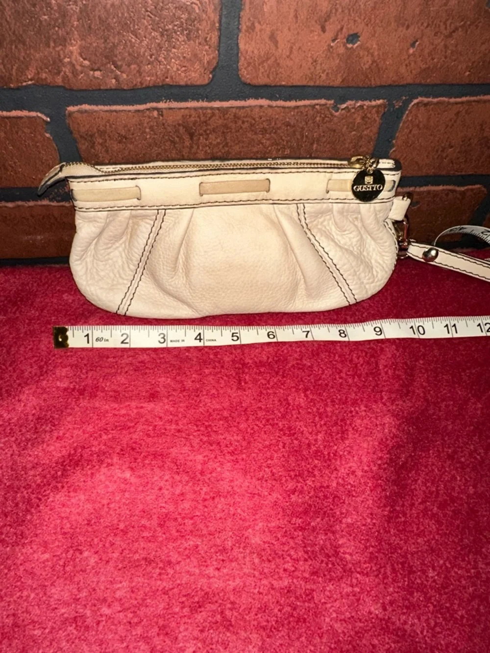 Cream Leather Wristlet Clutch with Gold Medallion Accent
